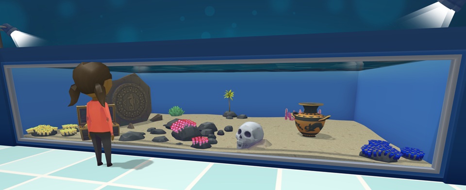 Een Bezoekster bekijkt een Muur-Aquarium van links. In het Aquarium liggen drie Button Polyps-kolonies: links een gele, middenin een rode en rechts een blauwe variant. Achter en tussen de Dieren liggen een Azteeks Rad, een Open Schatkist, een Schedel, een Griekse Vaas en diverse Rotsen en Planten.