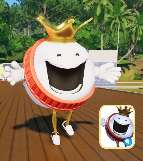 King Coaster in vooraanzicht. Hij is een witte bol-met-gezicht, heeft een rood 'erelint' rond zijn lichaam en een gele vijfpuntige kroon op het hoofd. Rechtsonder staat het miniportret zoals dat verschijnt in het spelmenu.
