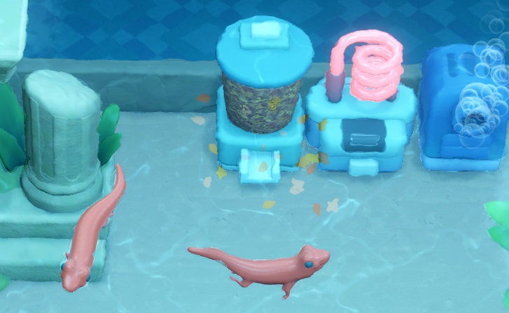 Twee Cunning Skinks in hun Aquarium. Achteraan staan, van links naar rechts, de Flake Food Dispenser, een spiraalvormig Verwarmingselement en een Filter die bellen blaast.