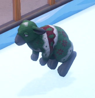 Een Festive Jumper springt naar links. Zijn vacht is rood/groen, met gebreide sterren en denneboompjes.