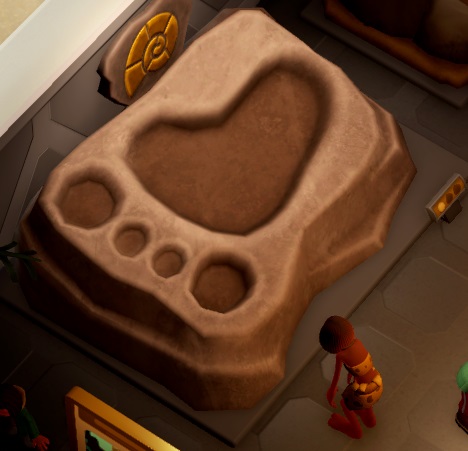 Een Left Footprint Fossil wordt bekeken door een Holbewoner.