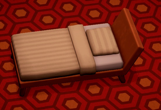 Het Lodge Bed heeft een moderne, hoekige vormgeving en een strepenpatroon op deken en hoofdkussen.