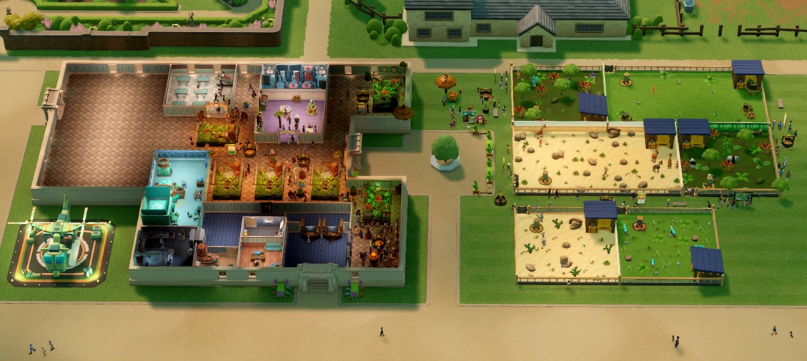 Een bovenaanzicht van het Silverbottom Park Museum met linksonder de Helipad, links het Hoofdgebouw en rechts diverse Habitats met Dieren.
